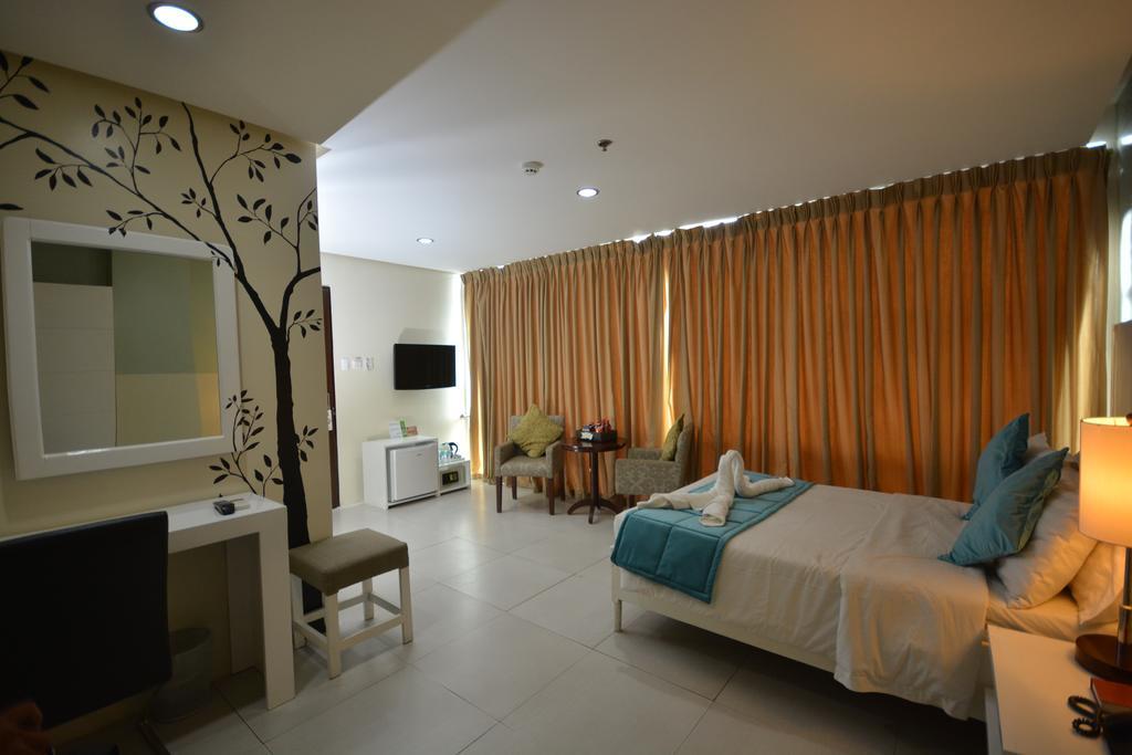 Empire Suites Hotel Пуэрто-Принцеса Экстерьер фото
