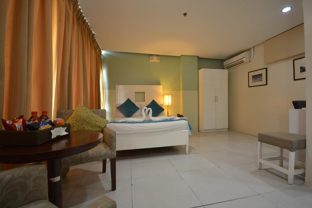 Empire Suites Hotel Пуэрто-Принцеса Экстерьер фото